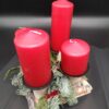 Centrotavola con candele rosse