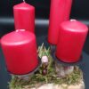 Centrotavola con candele rosse